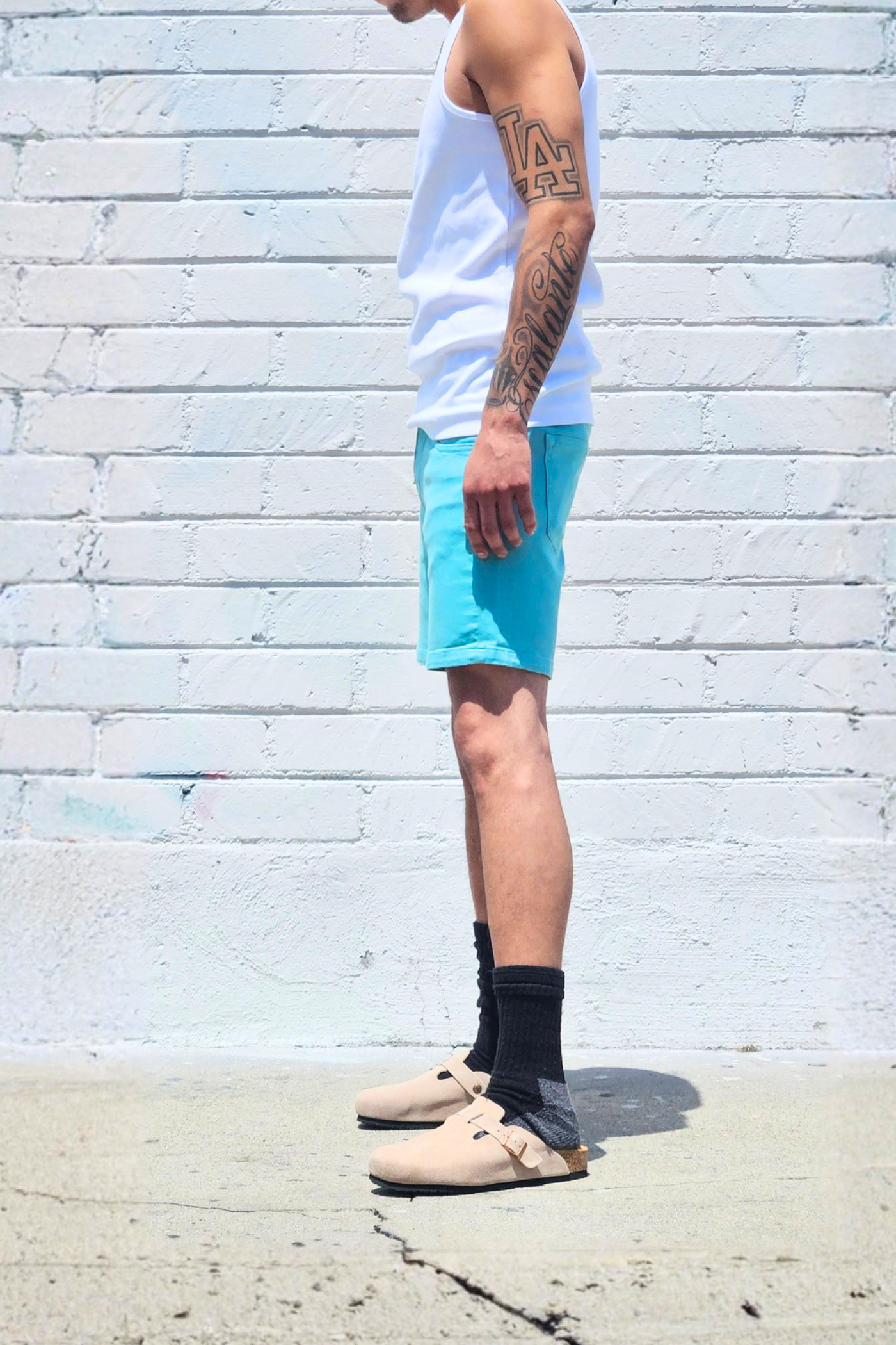 Sea green casual denim shorts with a relaxed summer silhouette.