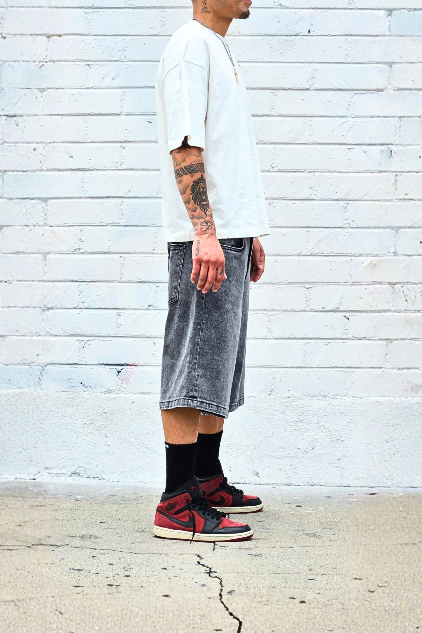 black-acid-knee-length-denim-shorts.png