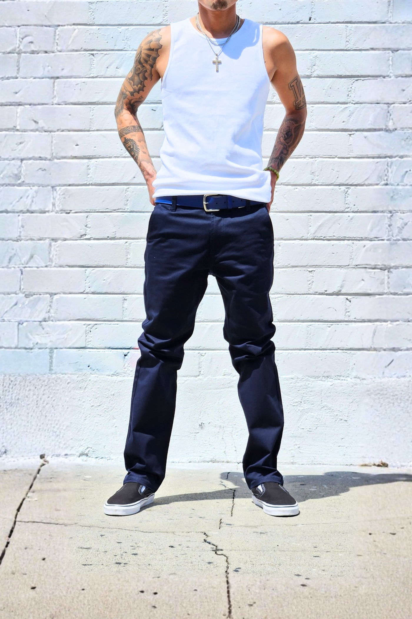 Navy cotton twill chinos with a clean and timeless silhouette.