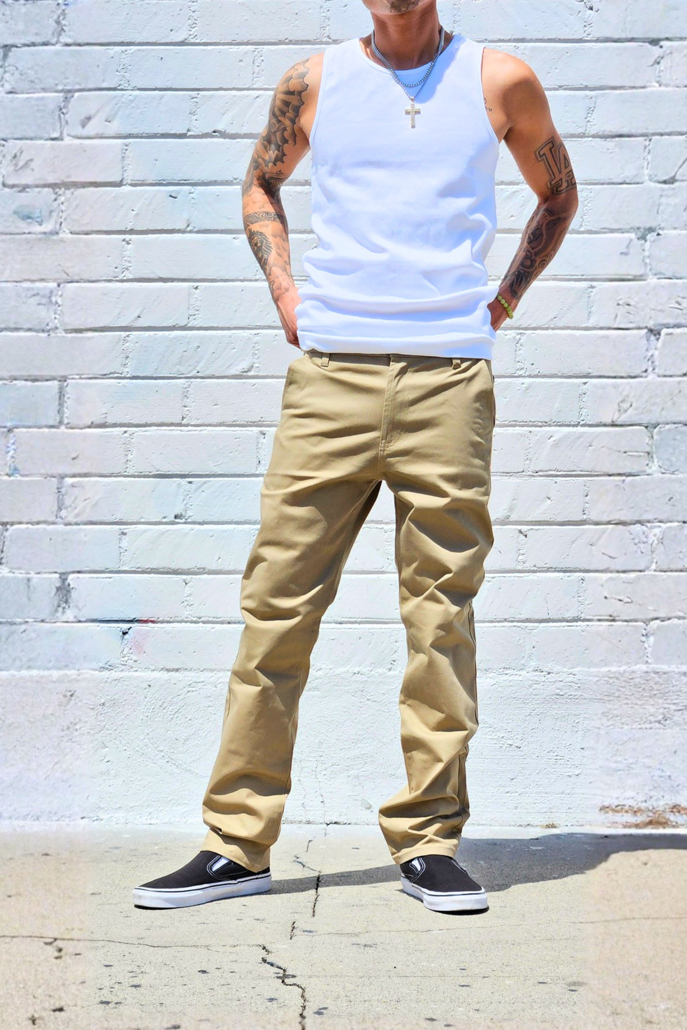 Khaki cotton twill chinos designed for comfort and versatility.