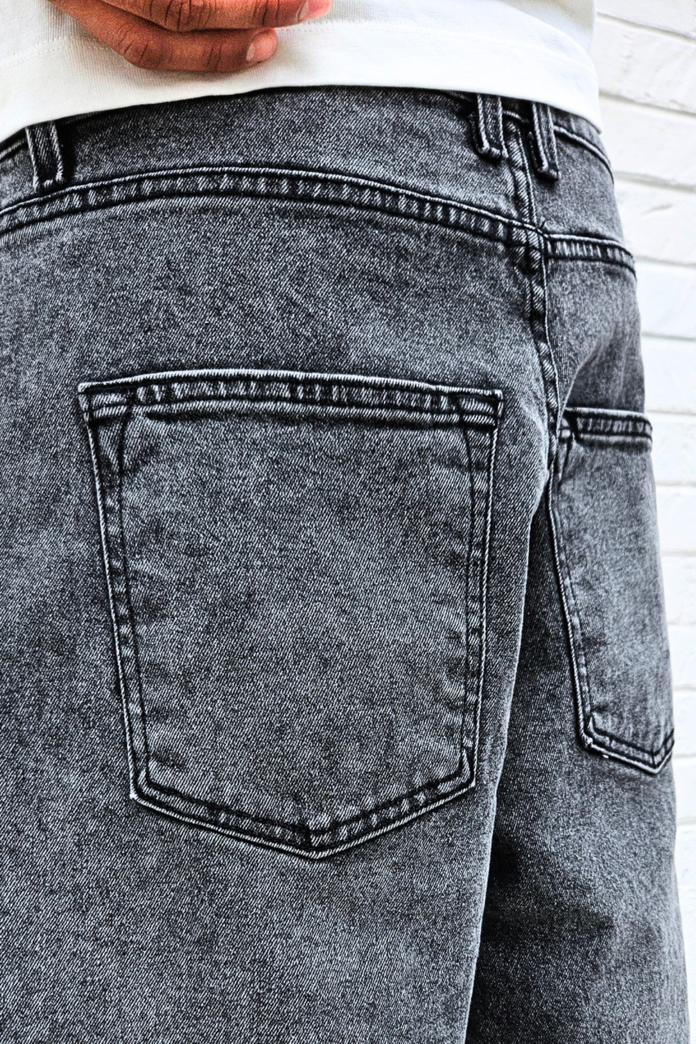 black-acid-wide-fit-jorts-denim-shorts-closeup.png