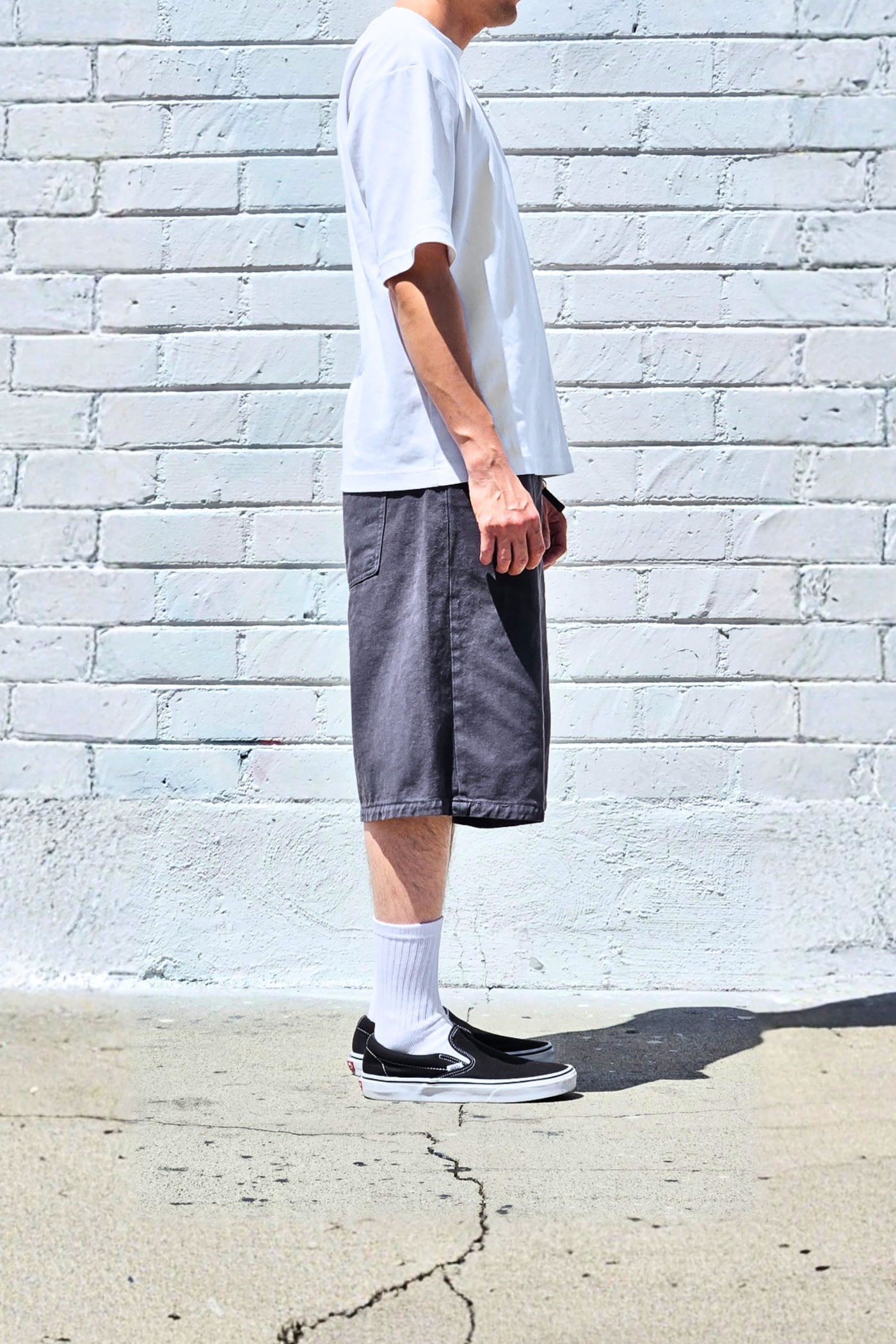 Longline charcoal denim shorts with a wide-leg baggy fit, perfect for summer outfits, skating, and everyday wear.