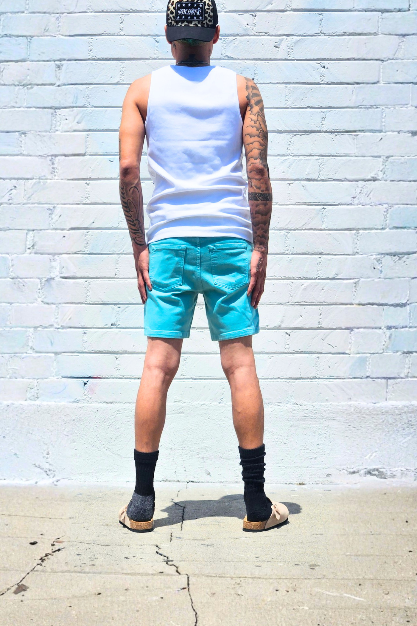 Teal festival shorts designed for outdoor activities.