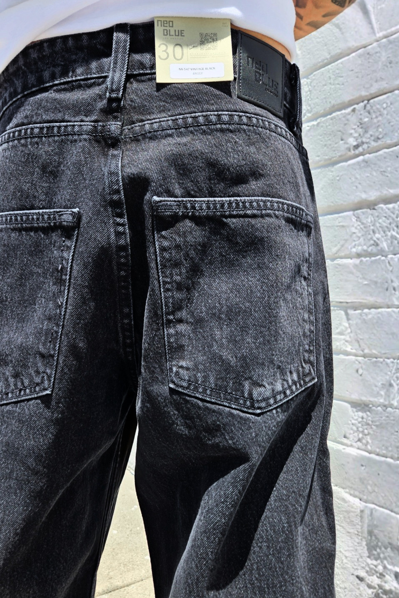 Neo Blue men's baggy jeans in vintage washed black denim.