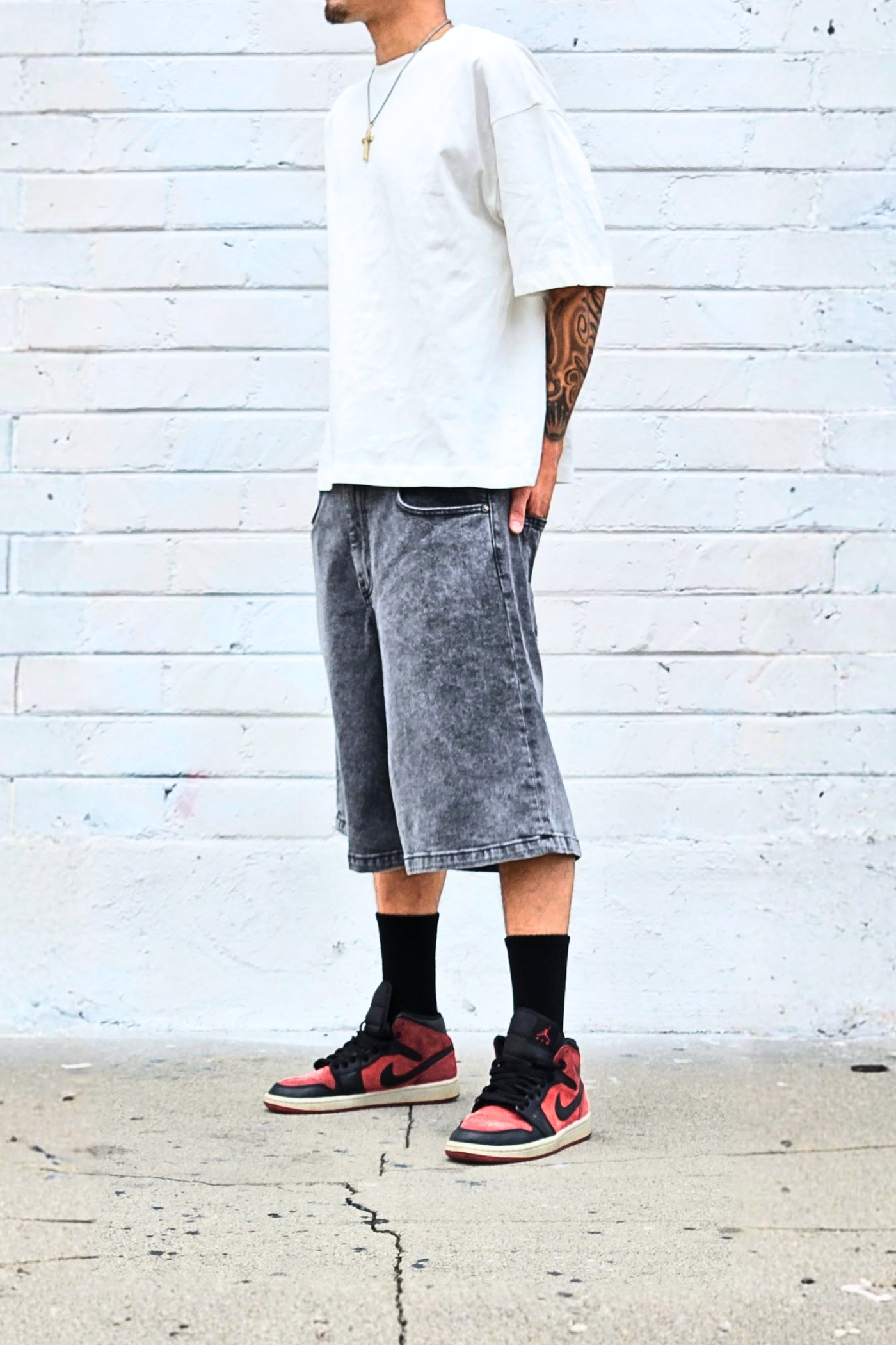 black-acid-wash-bermuda-denim-shorts.png