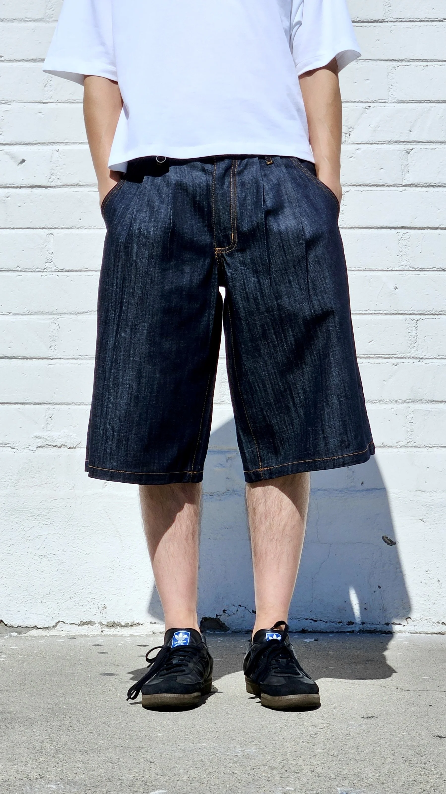 Front View Of Men's Baggy-Shorts Featuring Double-Pleats-Two-Tucks In A Baggy Style.