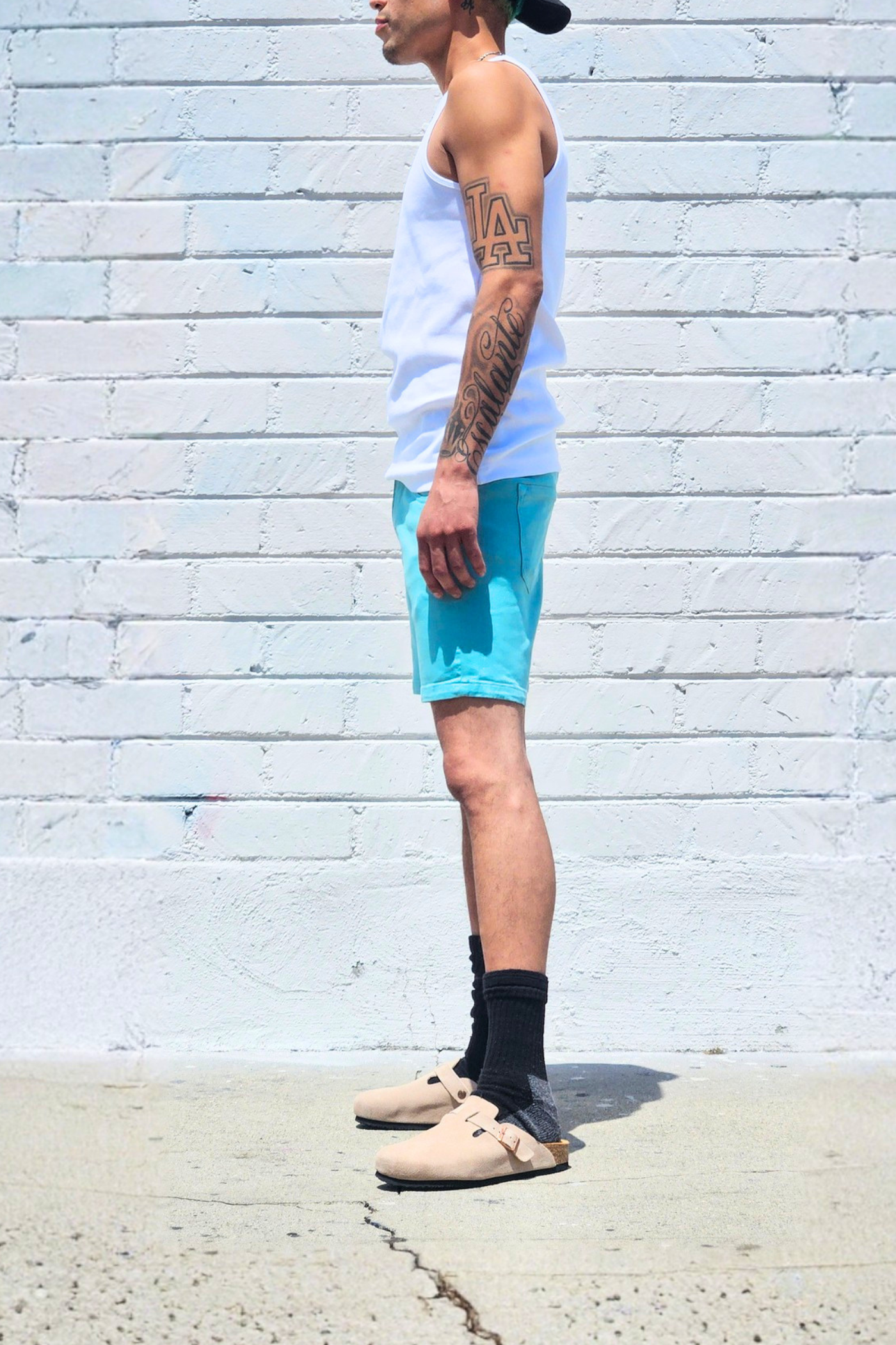 Sea green summer jorts with a relaxed streetwear-inspired look.