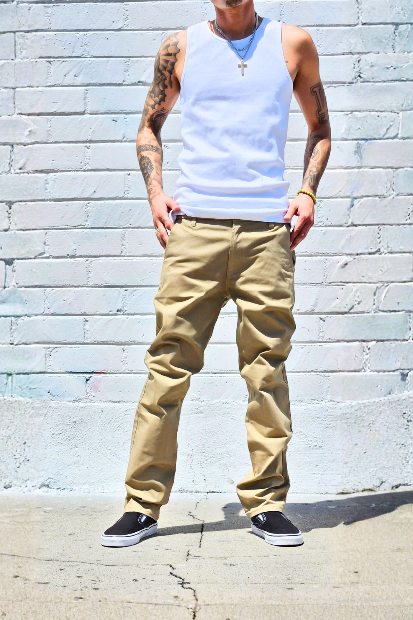 Men's khaki chino pants featuring a regular fit and timeless everyday styling.