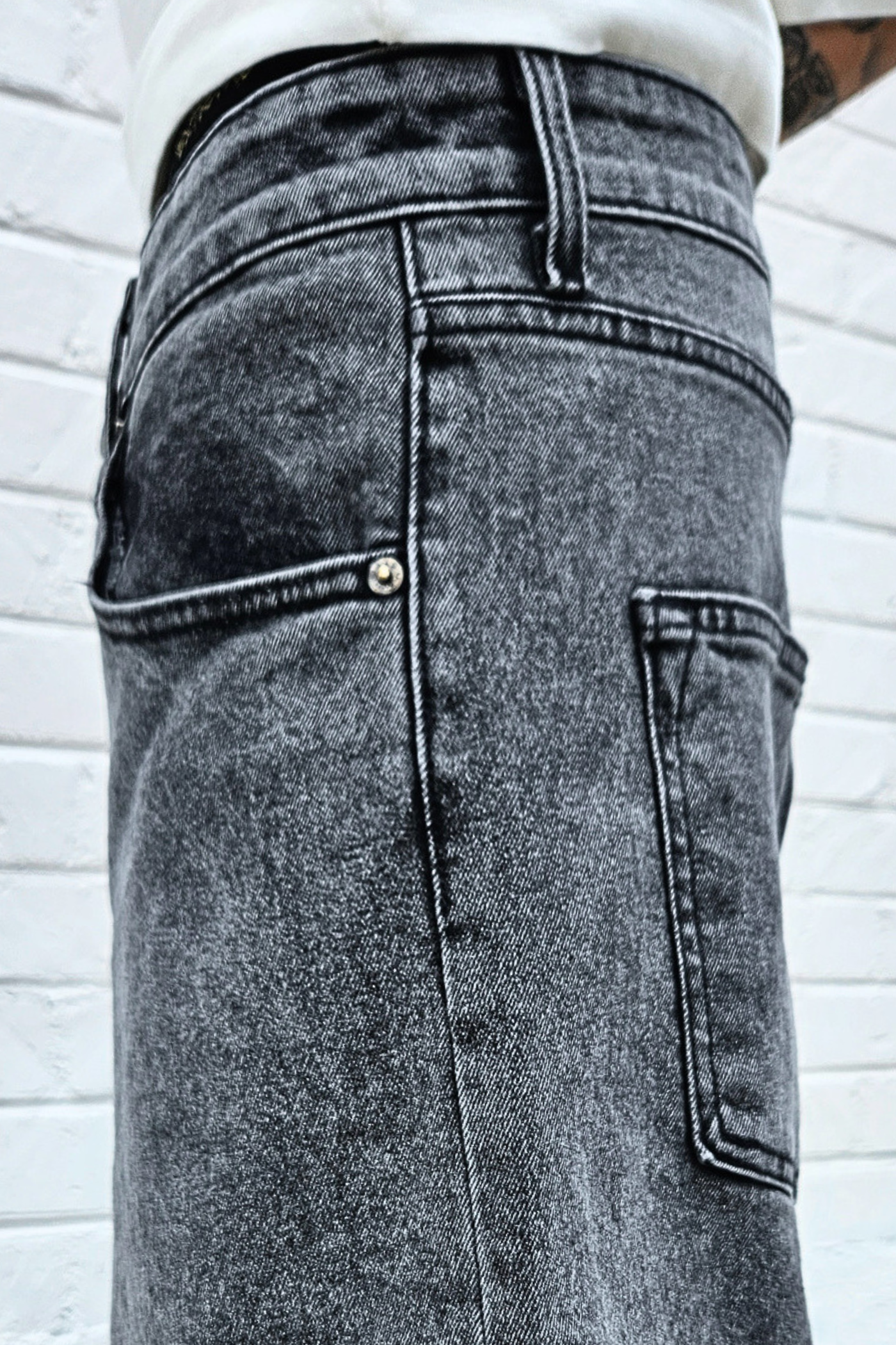 black-acid-wide-fit-denim-shorts-closeup.png