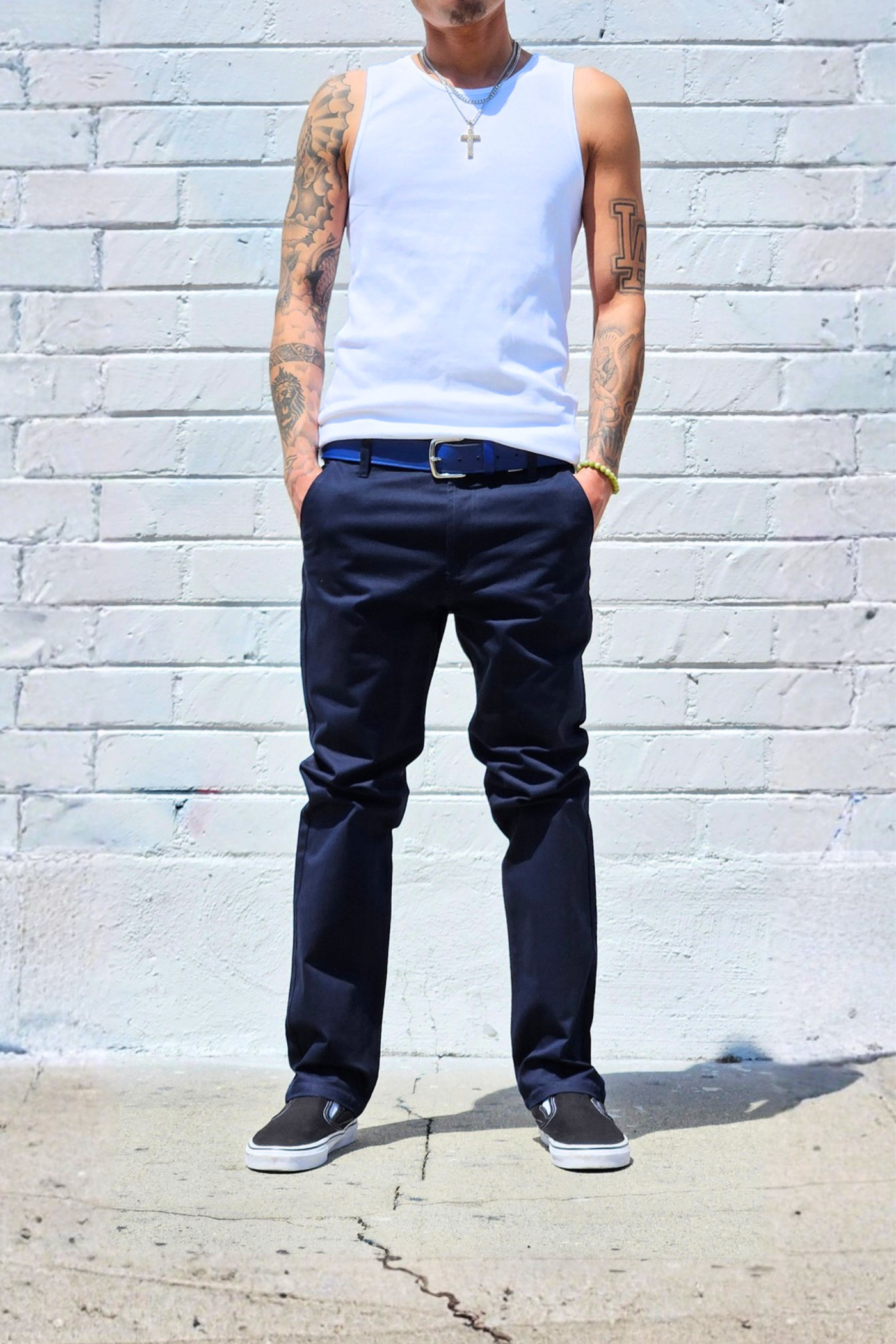 Men's navy chino pants featuring a regular fit and versatile everyday design.