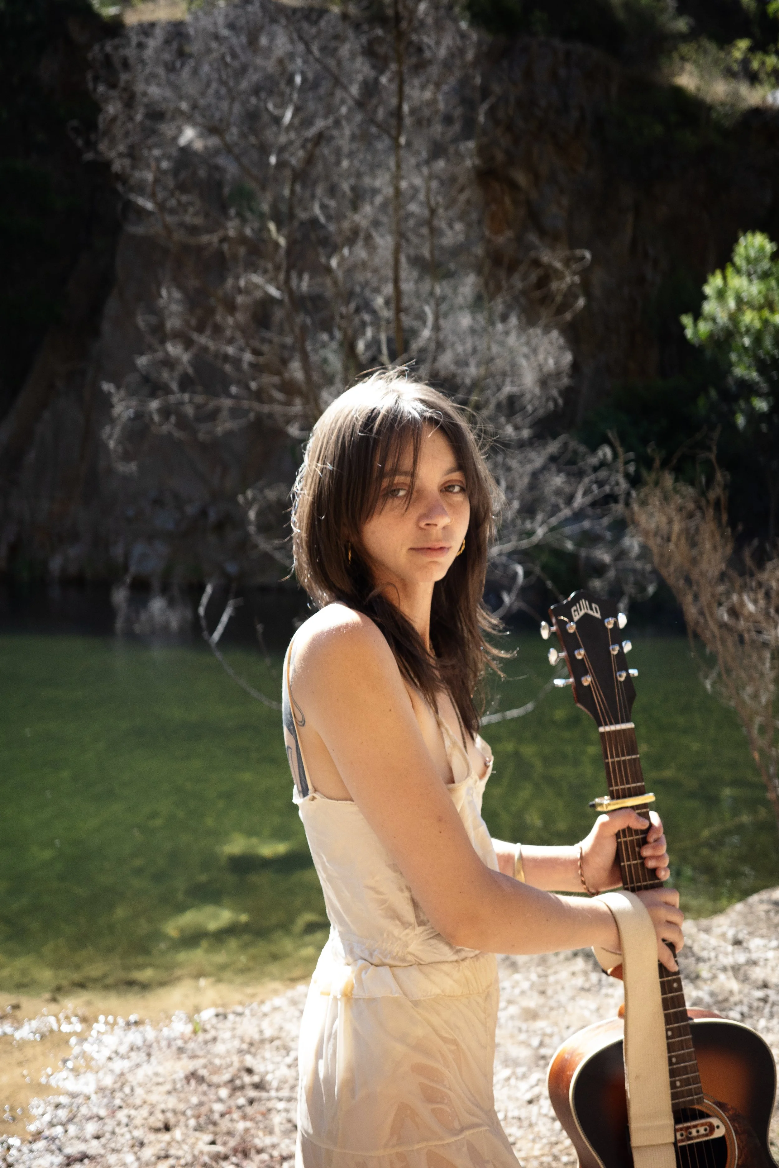 A.C Saunders Standing guitar.jpg