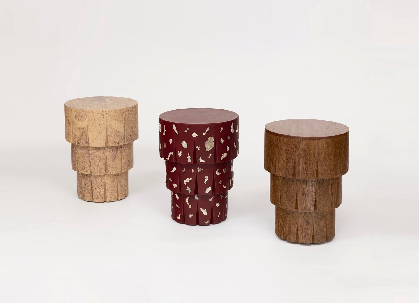 Milagritos Side Table in Hand Speckeled Parchment, Red Leather and Silver Milagritos and Tornillo Wood.

The unique texture of the Speckled parchment generates a trompe l&rsquo;oeil, where the Parchment can be perceived as stone, wood or cork, part o