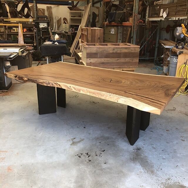 Dining table from Parota slab with charred douglas fir beams for base. #liveedge #slabtable #furniture #interiordesign #sanluisobispocounty