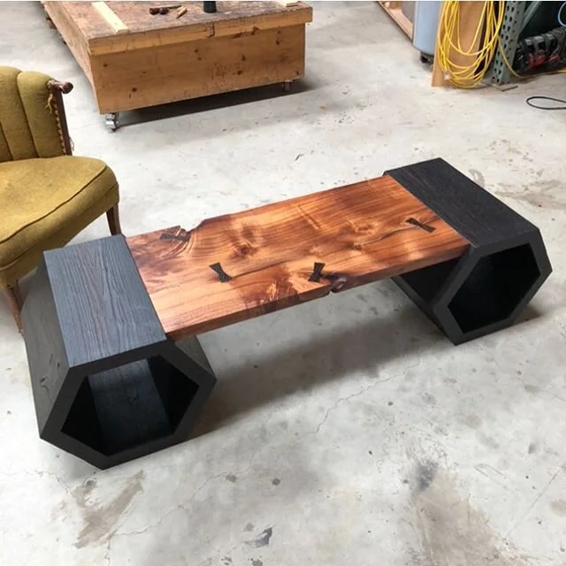 Custom acacia coffee table on charred walnut hexagons. Have a good weekend, friends! #americanstudiocraft #furniture #modern #geometric #coffeetable #woodworking #interiordesign #interiordecor #sanluisobispocounty