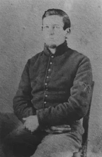 Figure 4: Pvt. William Perkins of the Pioneer Brigade’s 3rd Battalion sports pioneer chevrons. Note his chevrons are applied directly to the jacket.