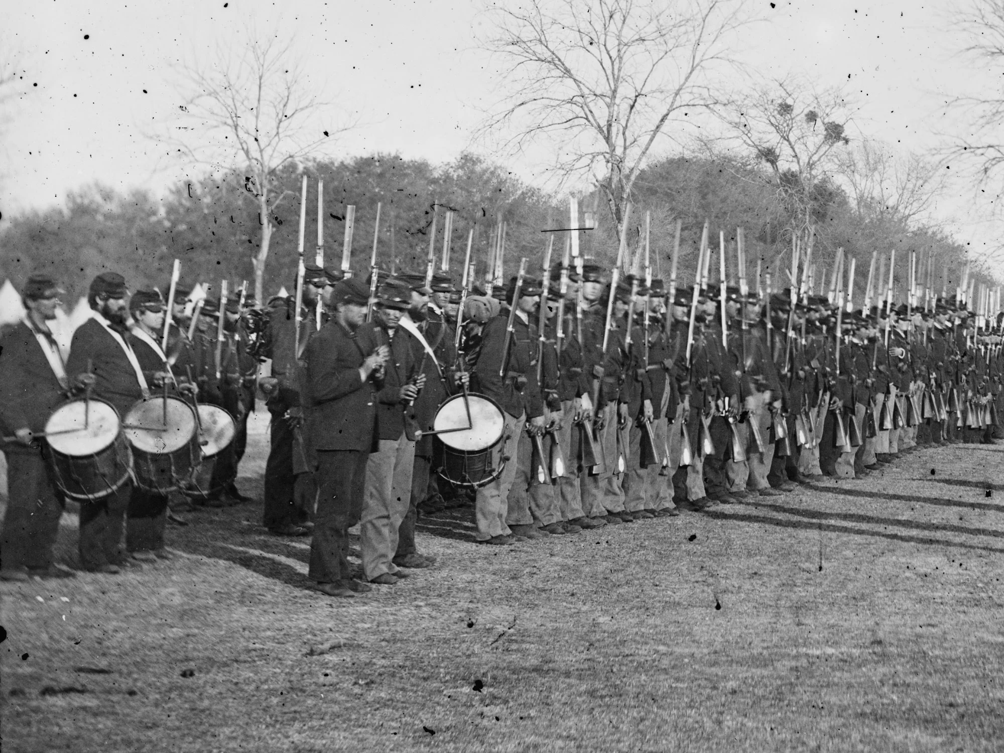 February, 1862. While some units were still completely outfitted with dark blues, others like the 50th Pa. already began seeing some light blues in the ranks by early 1862. (LOC#: LC-B811-156A)
