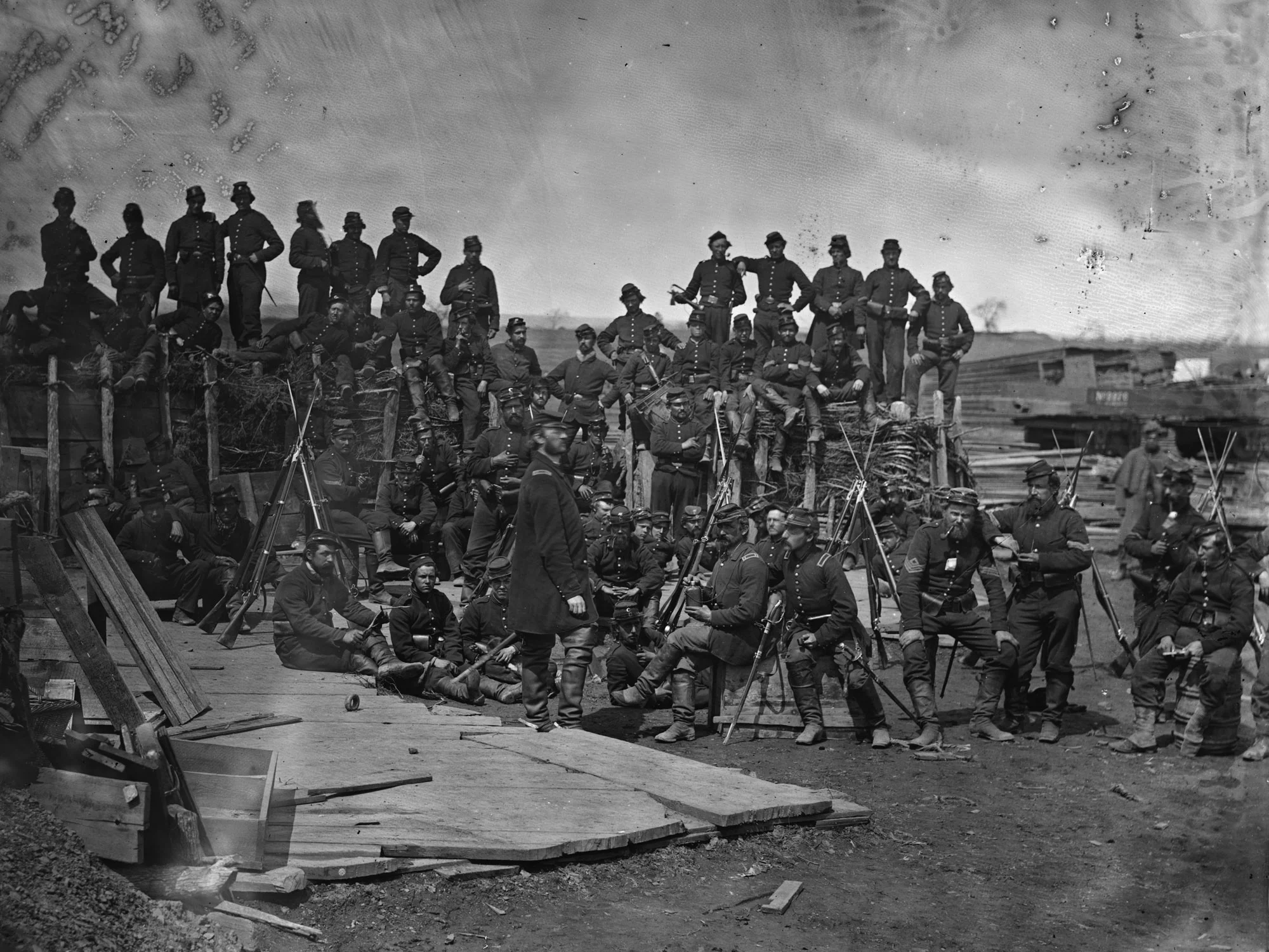 July, 1862. Men of Co. C, 41st New York Infantry near Manassas, Va. This entire company on campaign is still wearing dark blue pants during the late summer of 1862. (LOC#: LC-B817-7517)