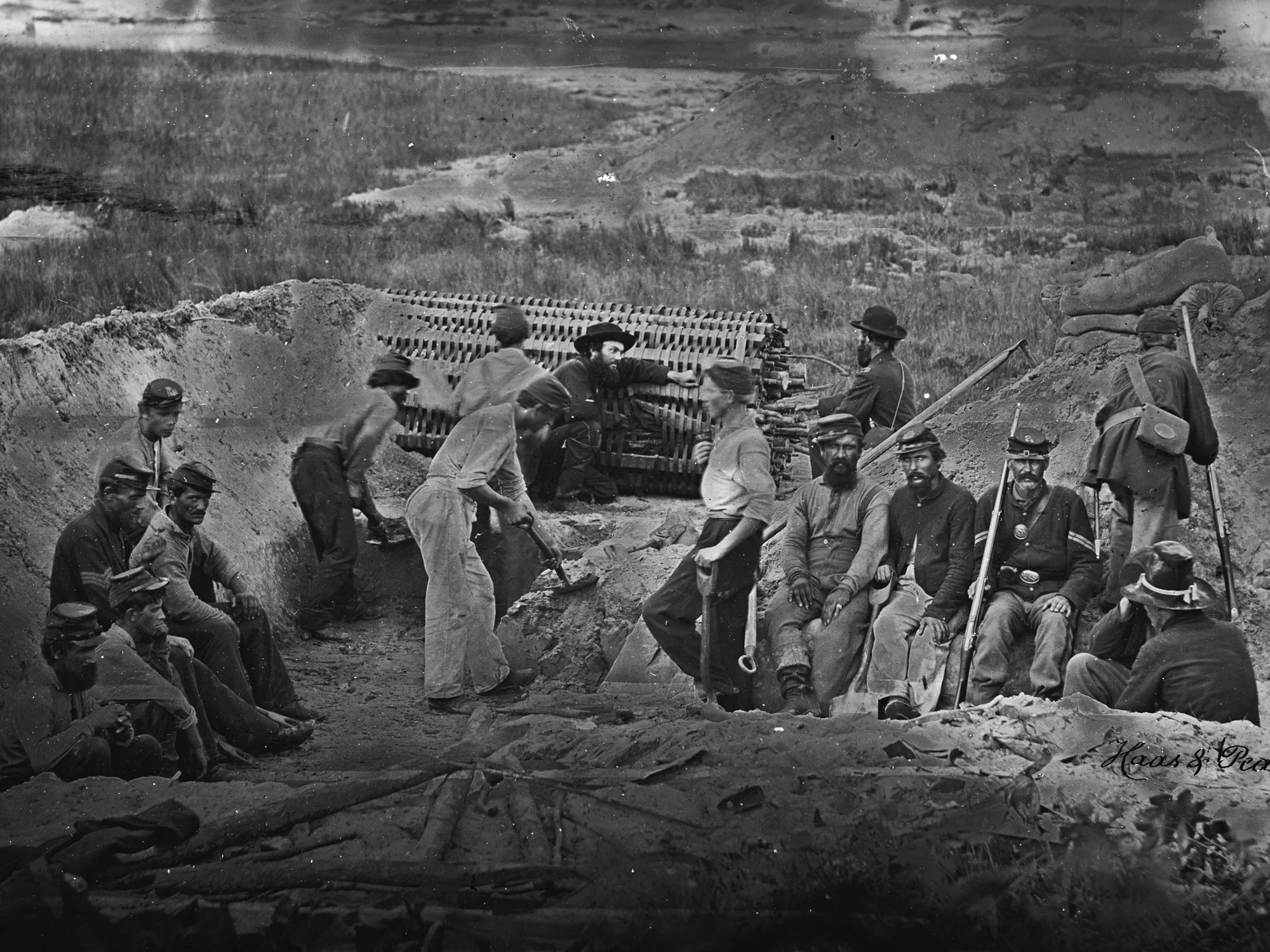 July or August, 1863 These men building fortifications on Morris Island, SC are wearing an assortment of sky blues, dark blues, and even what appear to be work pants made of white cotton drill. (LOC#: LC-B8156-17)