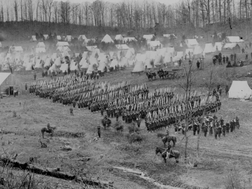 February 26, 1862 . A well known photograph of the 96th Pa. at Camp Northumberland. Notice their full dress uniforms: frocks, dark blues, dress hats, and some companies with gaiters. (NA#: 111-B-487)