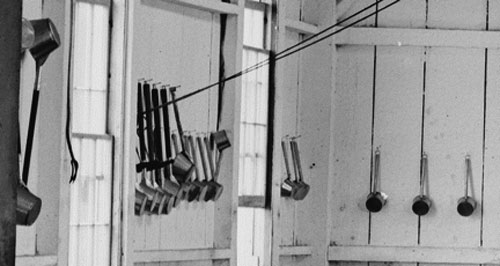 A meat fork hangs at left and there is no shortage of dippers. You can imagine the number of soldiers they would feed with this much equipment.