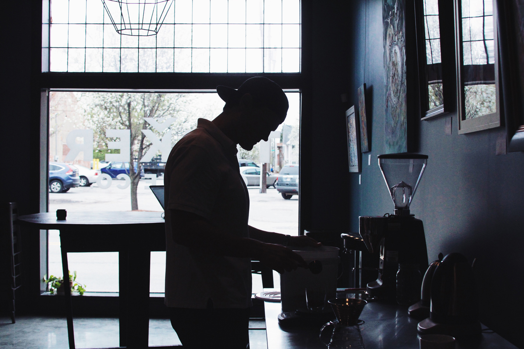 Tinker's Steven Hall weighing out coffee at the roastery.
