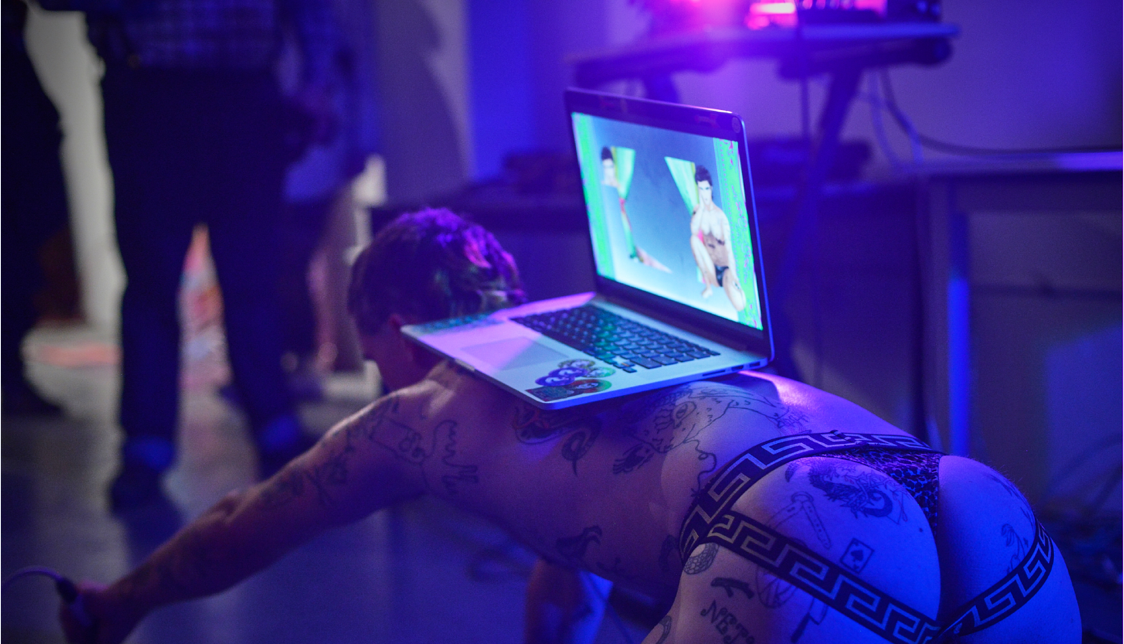 At 182 Avenue C’s “Half Life” opening, performance by Real Dominic . Isaac Emmons, 2019.