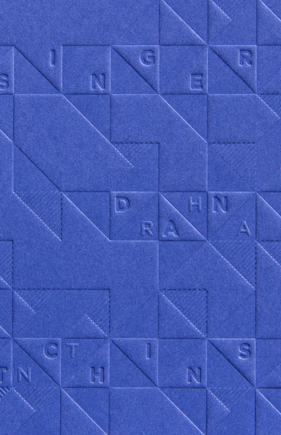 Cover des 8 faces Magazins für Typografie aus Bristol. Gestaltet von den sons of ipanema. Titel mit Muster aus Dreiecken als Blindprägung.