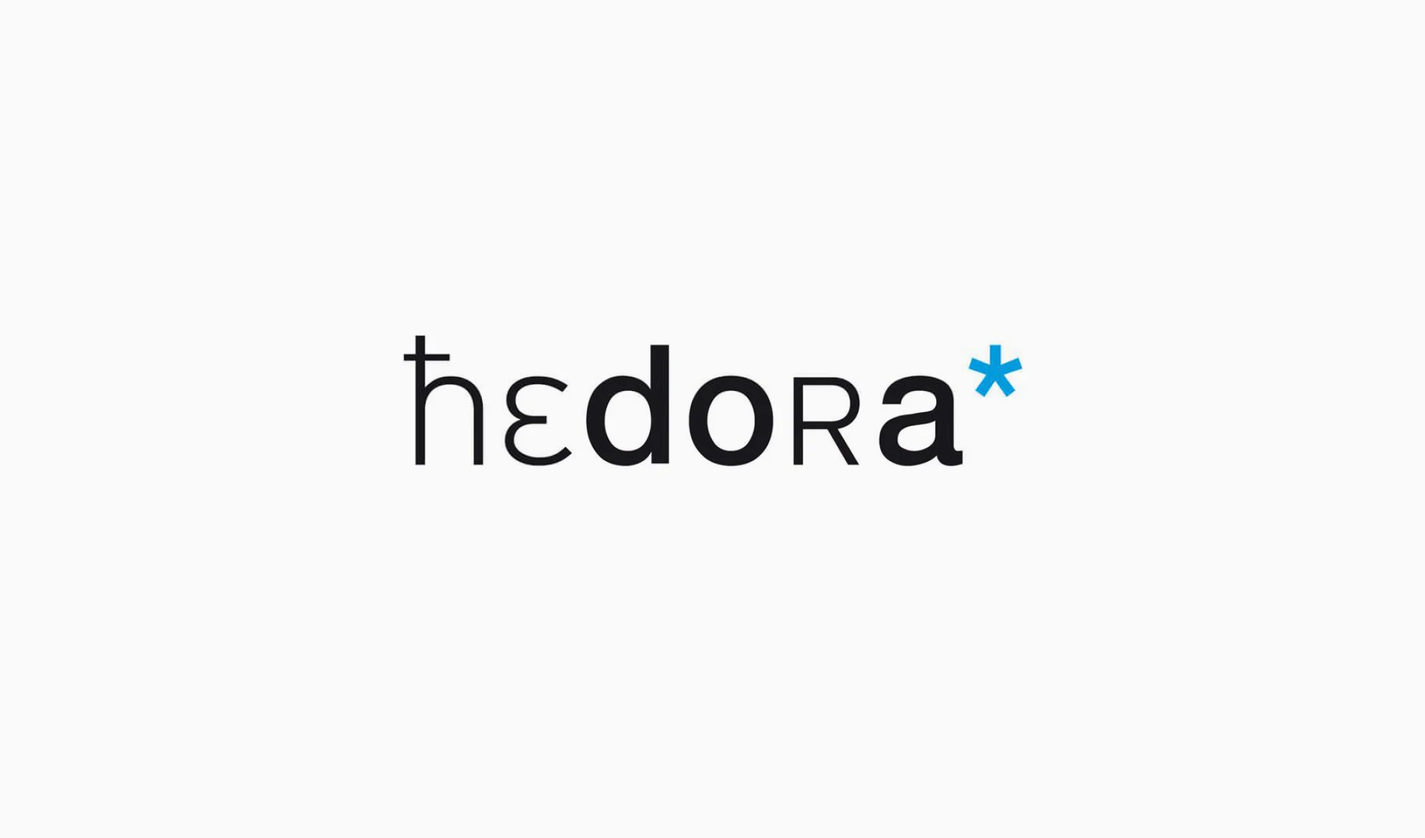 Die Wortmarke der Textagentur hedora basiert auf diversen Glyphen.