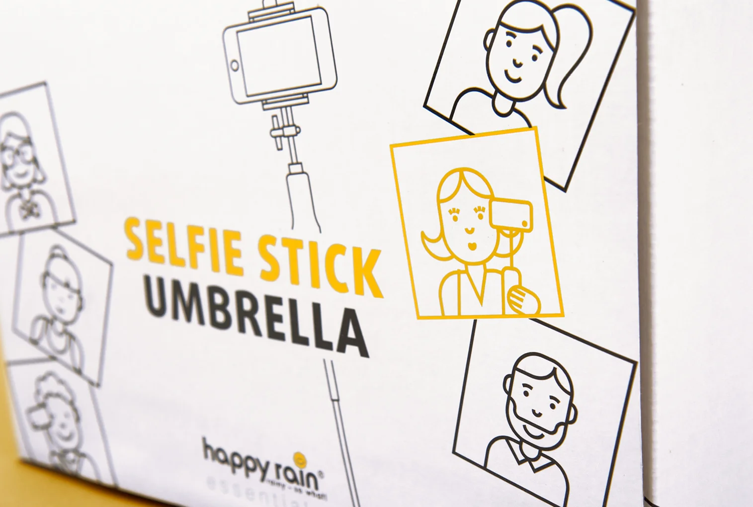 Clos-Up der Verpackung happy rain Selfie Stick Umbrella / Konzeption und Design von der Corporate Design Agentur sons of ipanema aus Köln