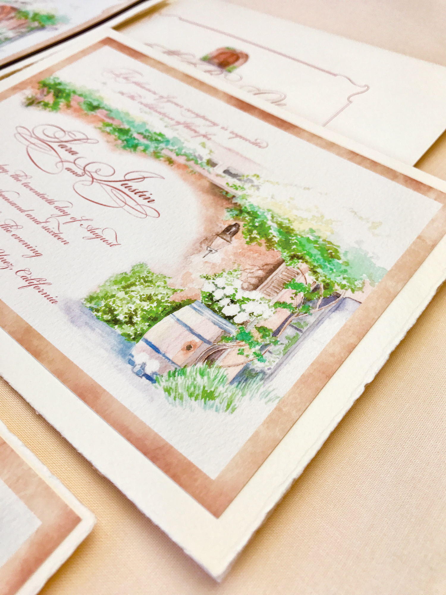The booklet opens up to the invitation inside