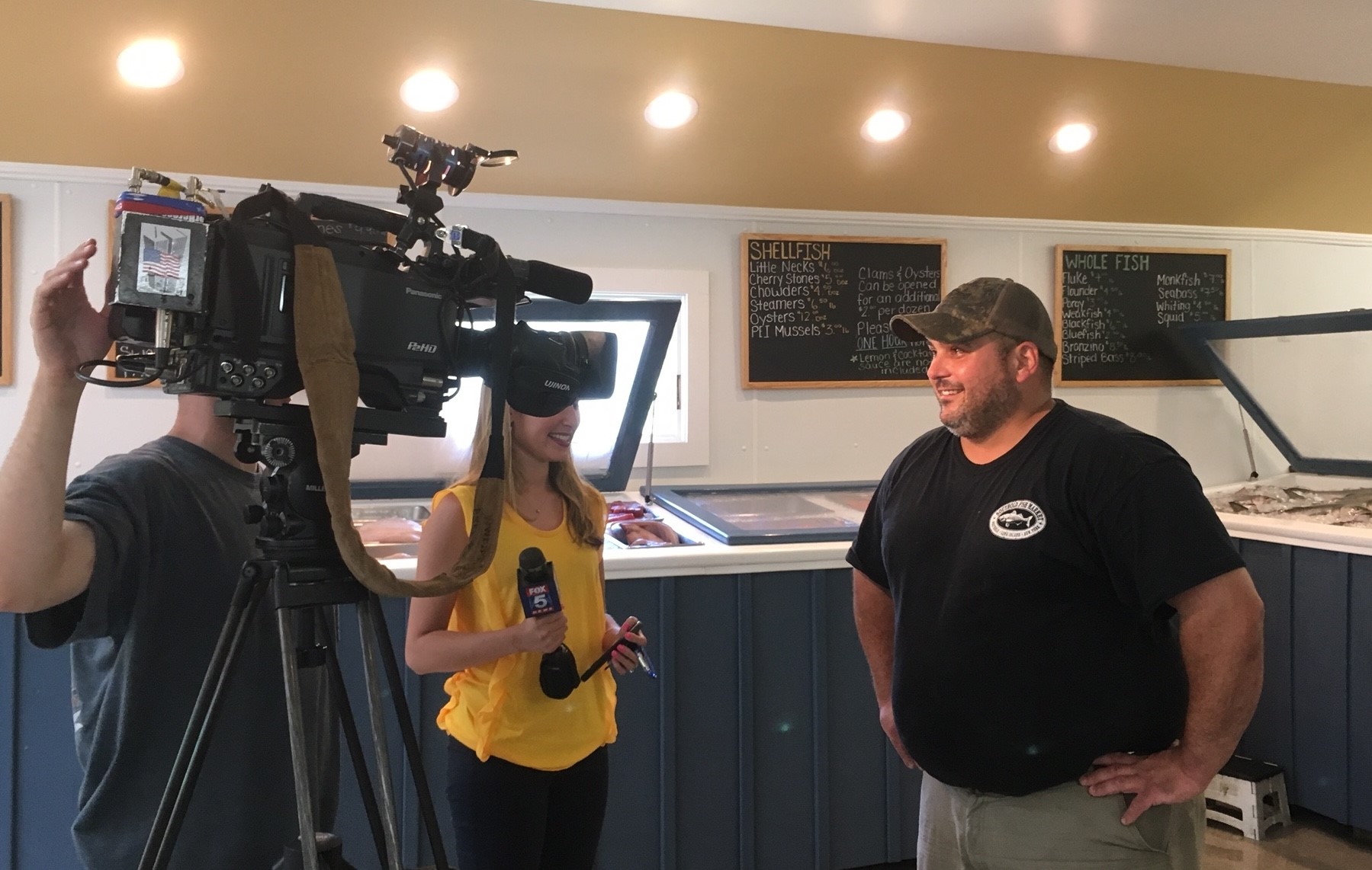 Fox 5's Jodi Goldberg interviewing Southold Fish Market owner Charlie Manwaring
