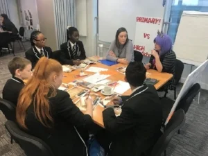 Pupils from Four Dwellings School working on the book with writer BB Taylor