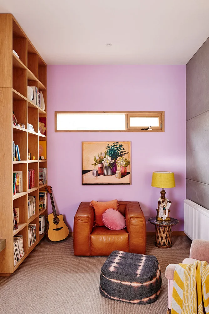 Create an unexpected color combination with a somewhat neutral color. This combination of Lavender and tan (with a pop of yellow) is not typically used but it doesn't feel like too loud of a statement because of the muted tan.
