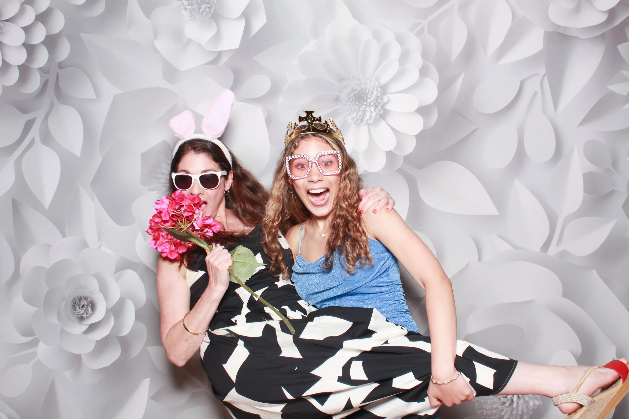 Two ladies having fun in a mirror me photo booth at Shawn Gardner dance studio in Tigard