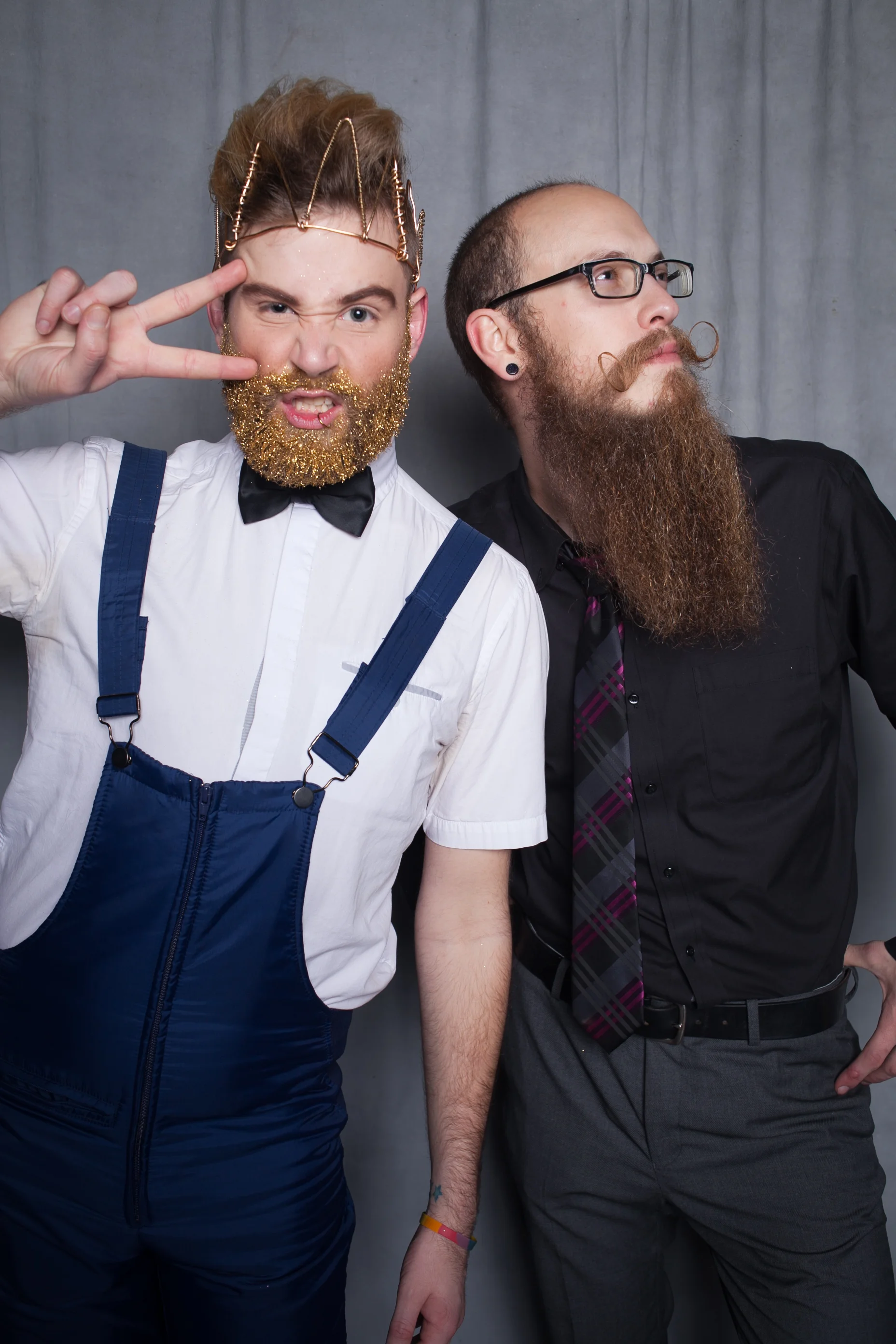 two hipsters pose with the Mirror Me photo booth rental in Portland Oregon