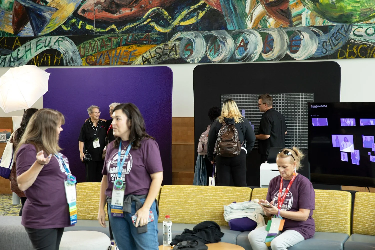 guests use photo mosaic wall at Oregon Convention Center