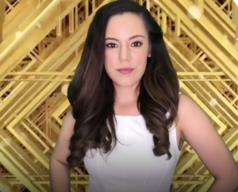 A woman posing in front of a gold art-deco backdrop for the 4-hour Deluxe Salsa Photo Booth package with green screen option.