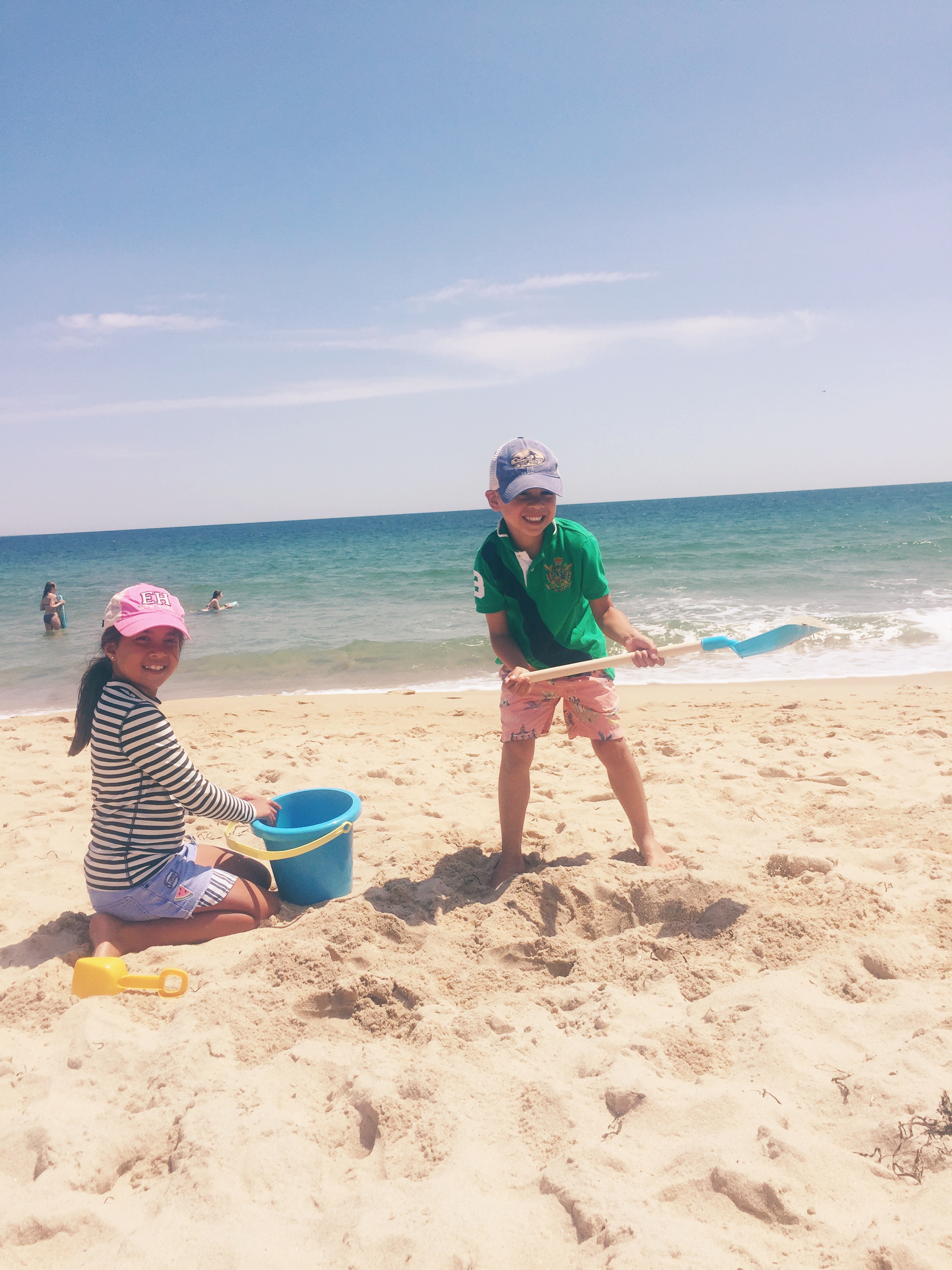 Watch Hill, East Beach Olivia rash guard top is by crew cuts and shorts from Zara Max is wearing Ralph lauren polo and Crew cuts swim shorts