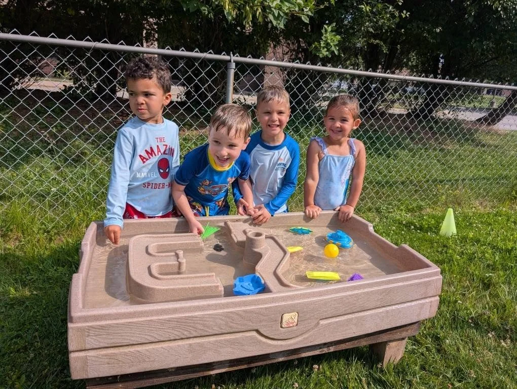 Pre-K children enjoying outdoor play at Twelve Corners Day Care Center