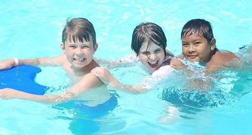 School-Age children enjoying swimming during the Twelve Corners summer program