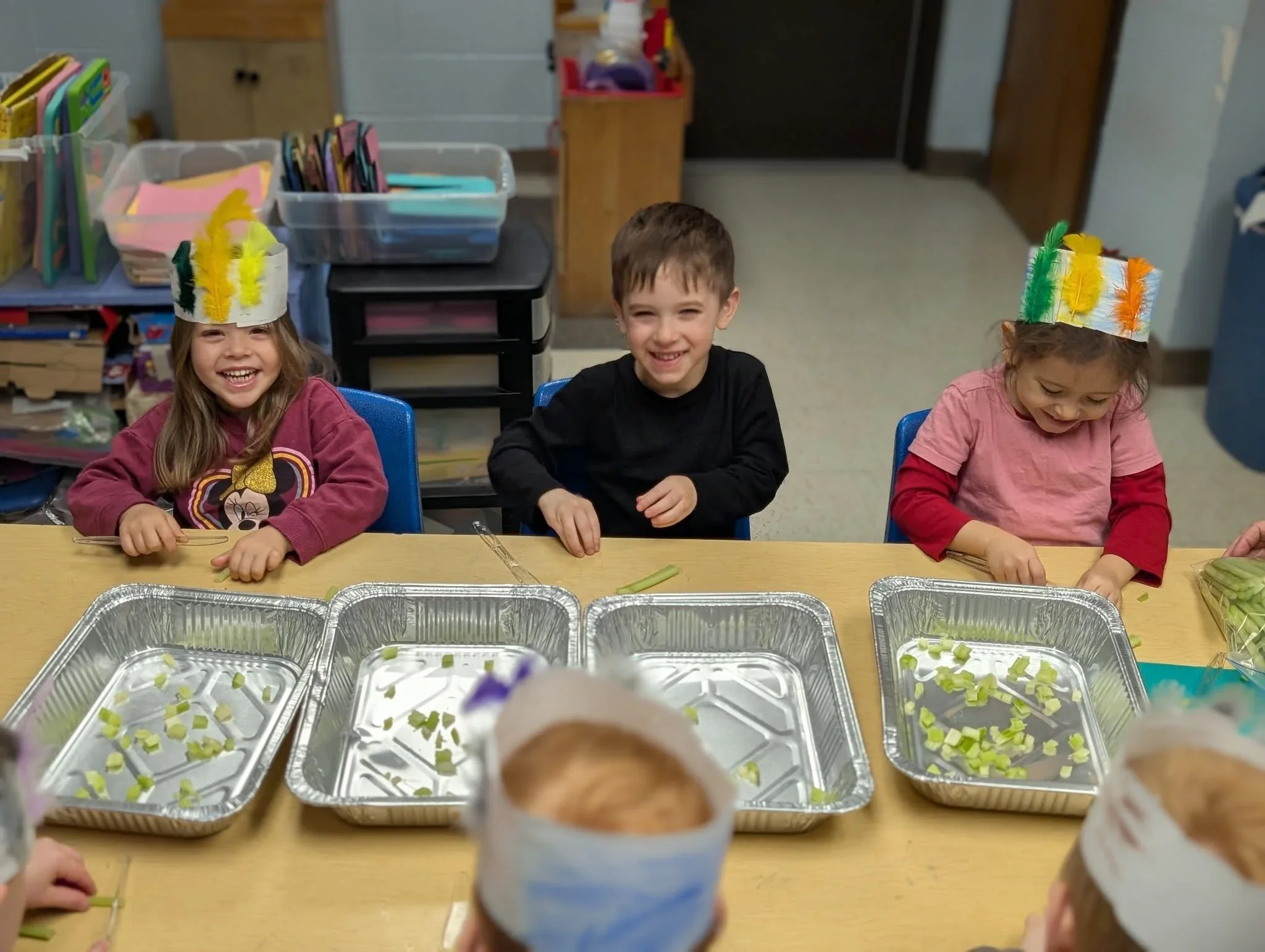 Pre-K children participating in a classroom learning activity