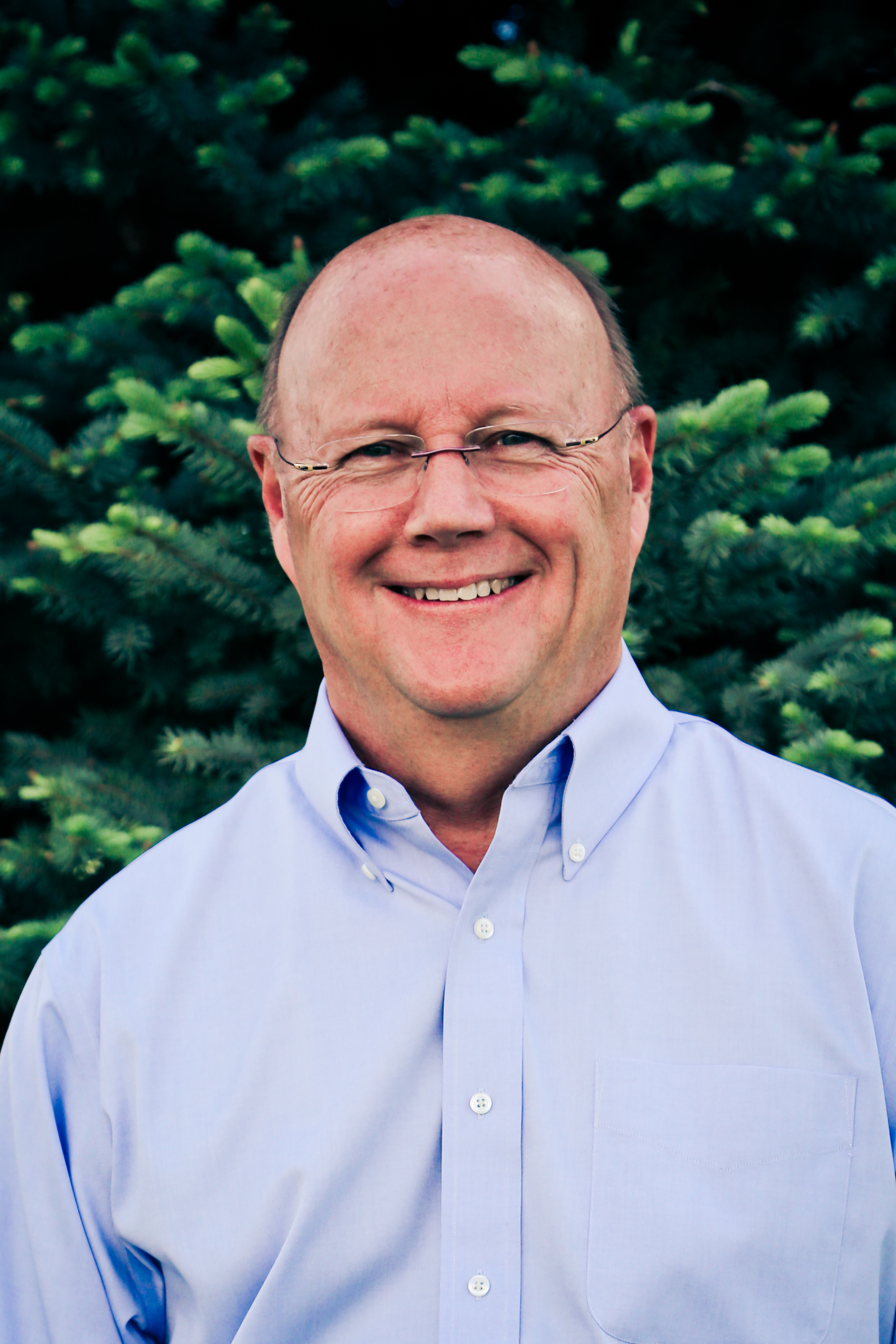 Dr. Larry E. Brazil, Chairman