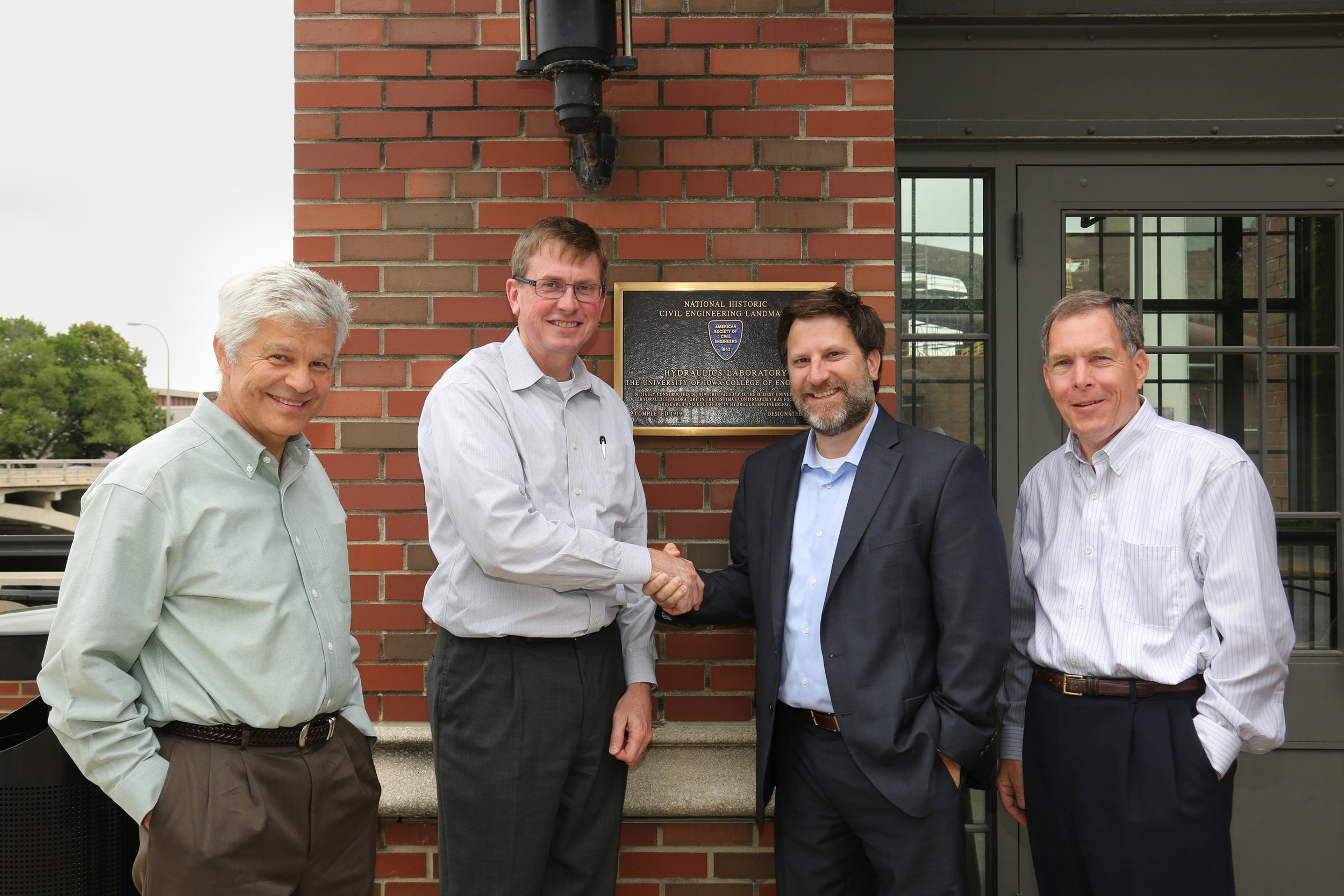 The Riverside team traveled to Iowa in late May to work toward common goals in the future of flood mapping. (From left to right: Witold Krajewski, Director of IFC, Larry Weber, Director of IIHR, Brian Ashe, CEO Riverside Technology, George Smith, Director of NCEI & SEFSC Programs.