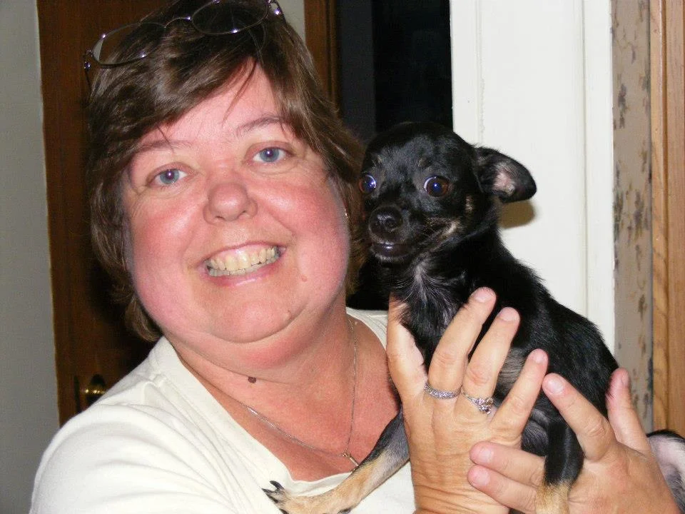 Chris Clark, Riverside's Staff Accountant and her puppy Rosco