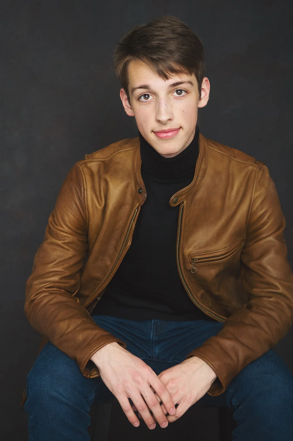 Cool senior boy in brown leather jacket and jeans_zachwieja.jpg