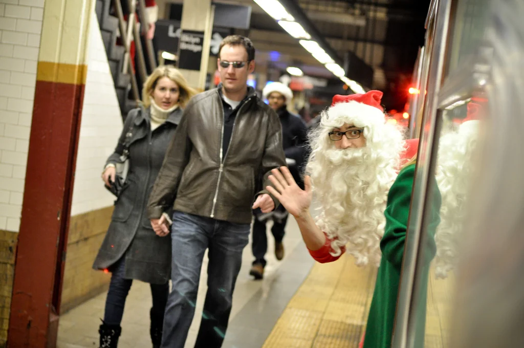 Santa on the 6 train during Santacon 2011.