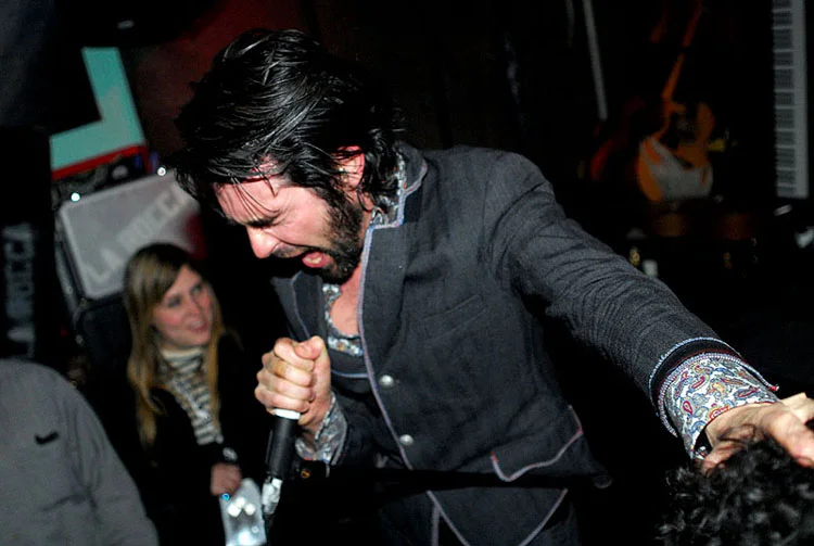 Jon Spencer of Heavy Trash reaches out to a fan on November 2, 2006.