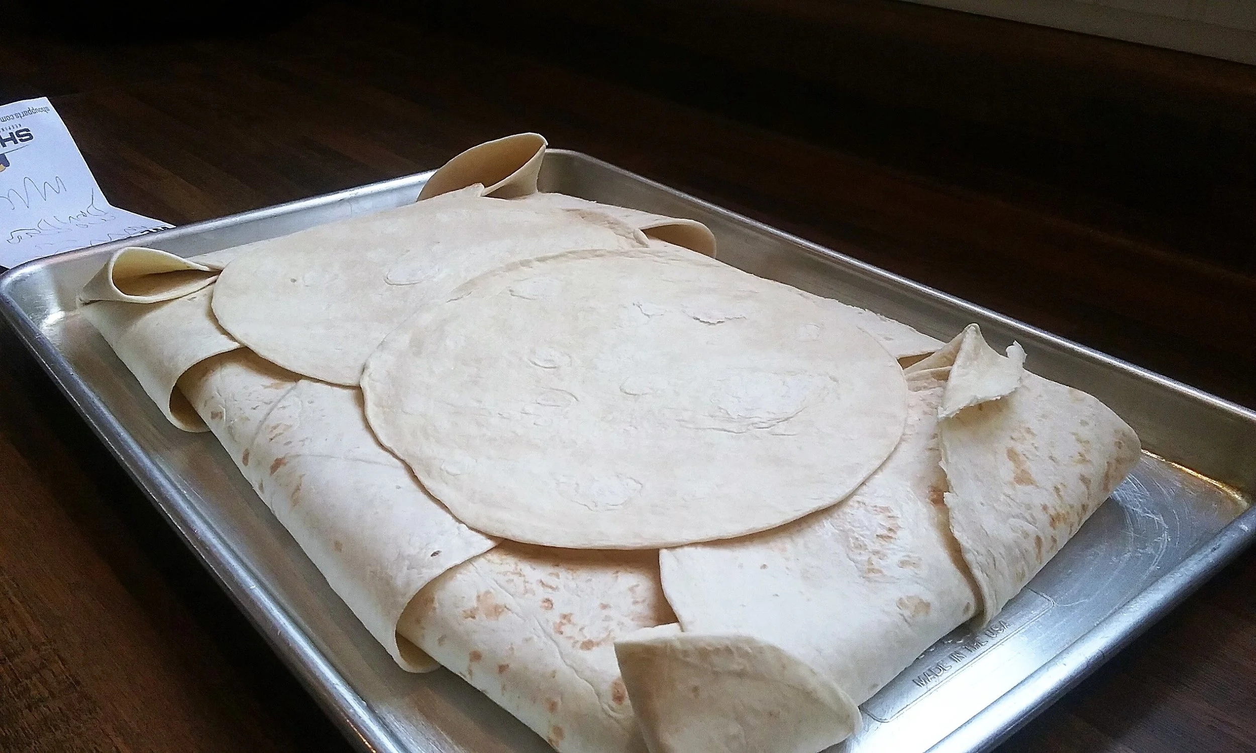 You can see from the above picture that the tortillas did not cover the middle, so just plop on a couple more and it will all be okay!