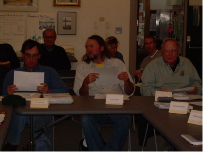 Eric Derleth, U.S. Fish and Wildlife Service; Tim Smith, MA Coastal Zone Management; Jack Whelan, Chequessett Yacht and Country Club (CYCC is involved in restoration land). In the background are members of the public, who are always invited to attend our meetings.