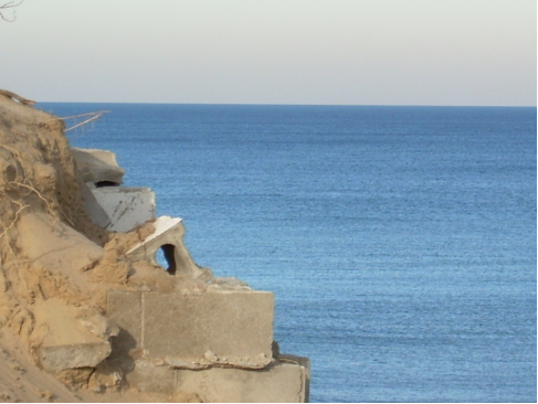 All that remains of the home in the beginning of this article. You may recognize this as apart of our Safe Harbor Banner, representing conflict with Natural Processes.